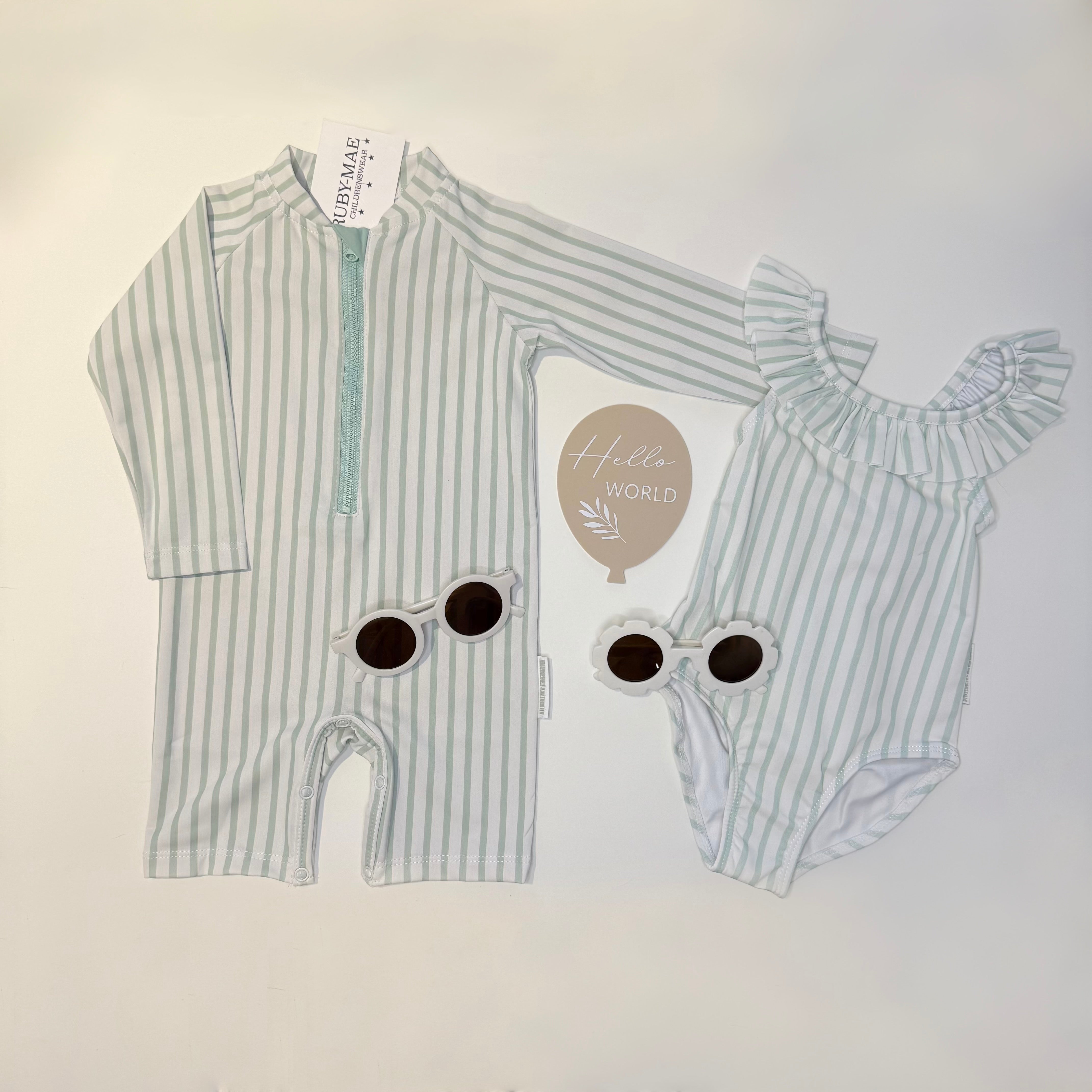 
                  
                    Mint Stripe Long Sleeve Zip Swimsuit With Matching Sunglasses
                  
                