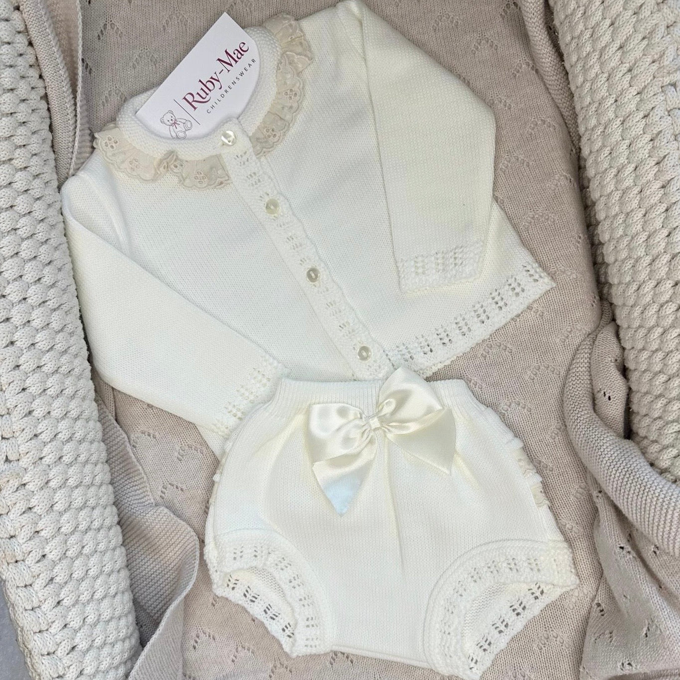 
                  
                    Baby Girls Cream Knitted Cardigan & Satin Bow Knickers Set - Penelope
                  
                
