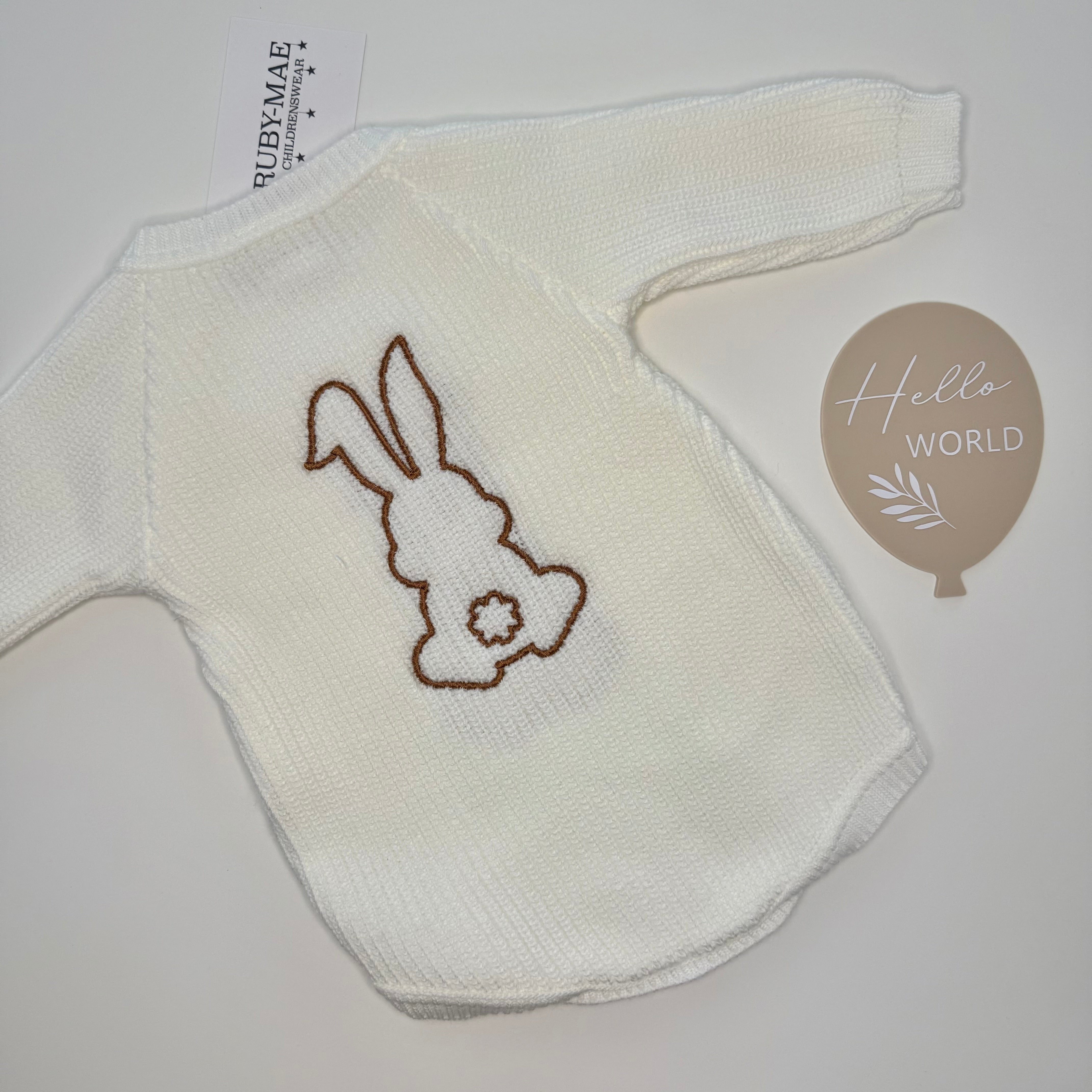 
                  
                    White Knitted Bunny Romper
                  
                