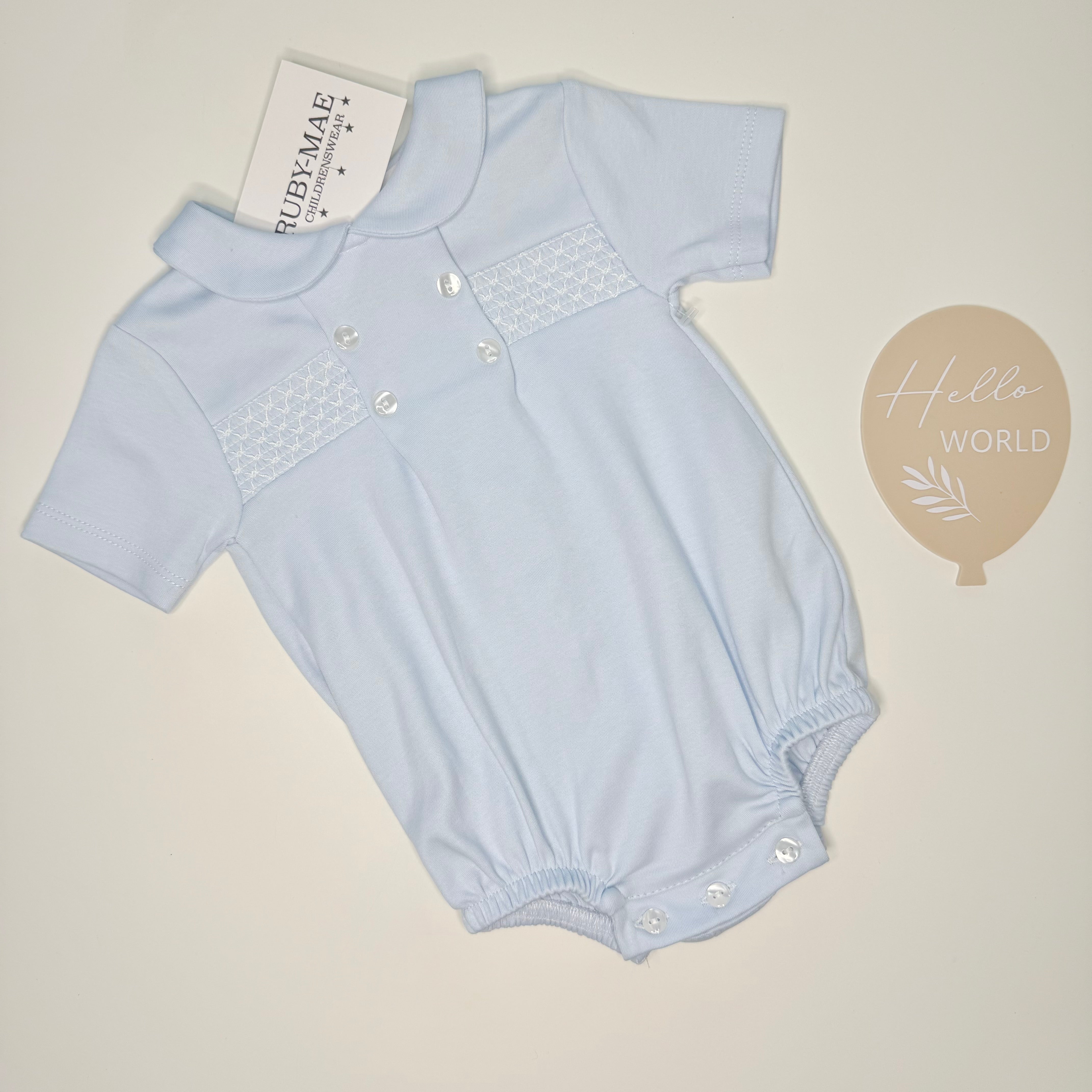 
                  
                    Blue With White Smock Romper - George
                  
                