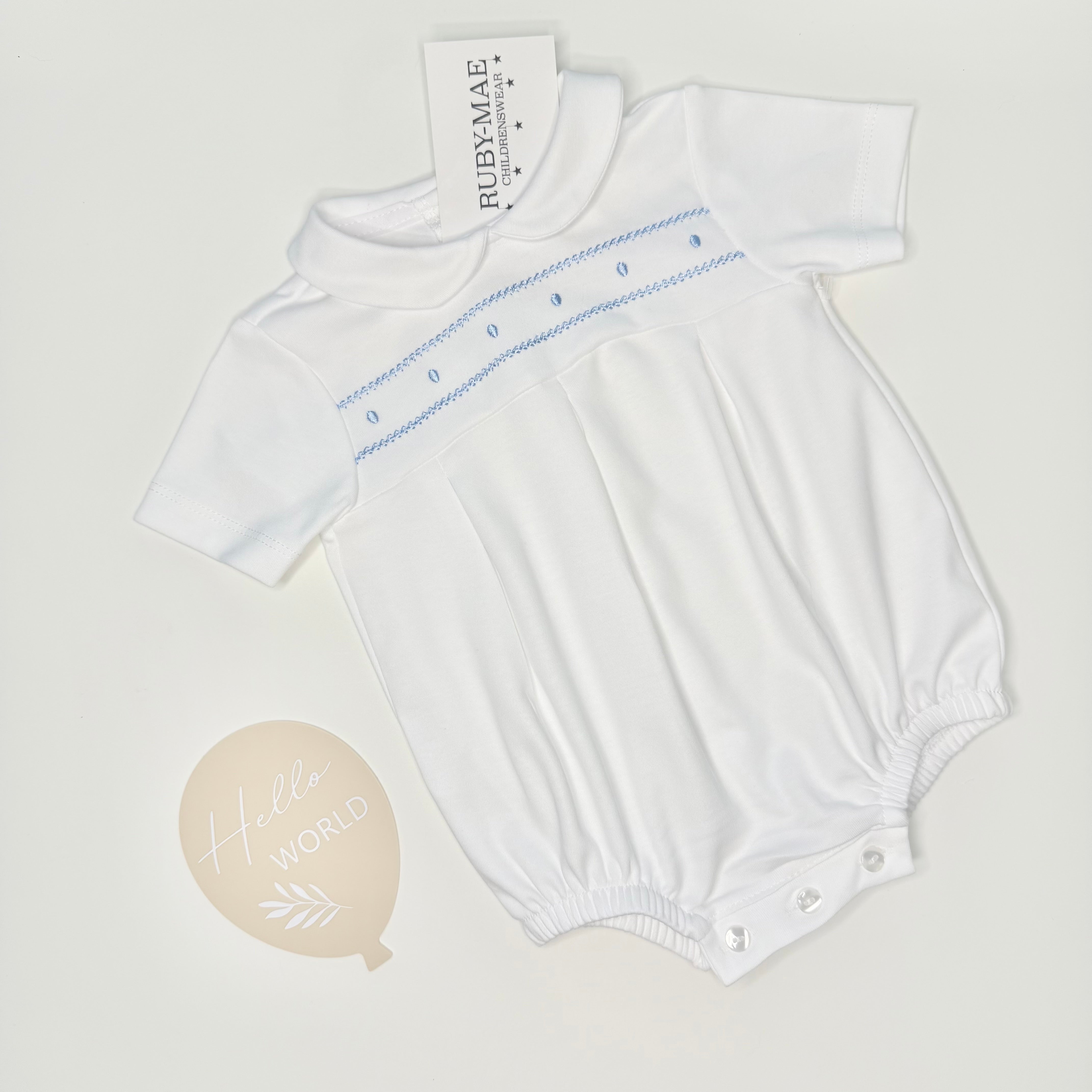 
                  
                    White With Blue Embroidery Romper - Chester
                  
                