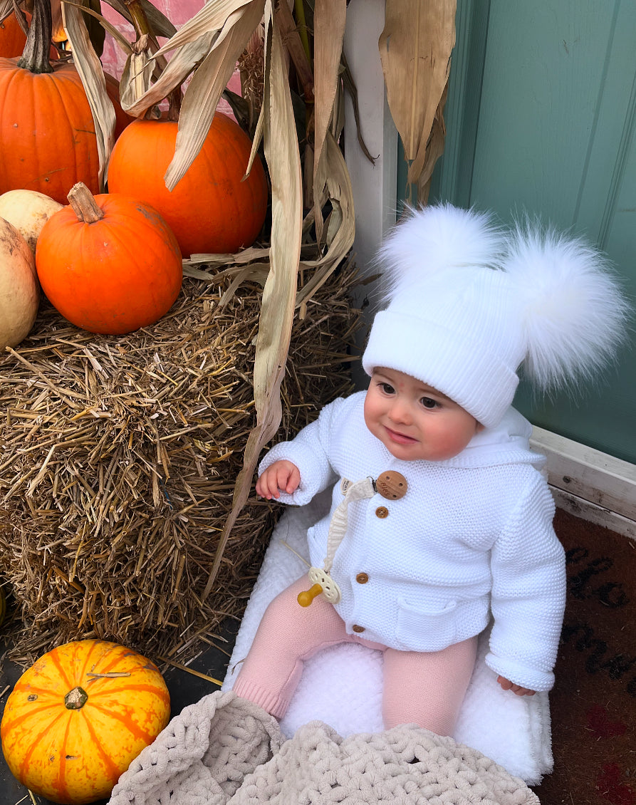 
                  
                    White Ribbed Faux Fur Pom Pom Hat
                  
                