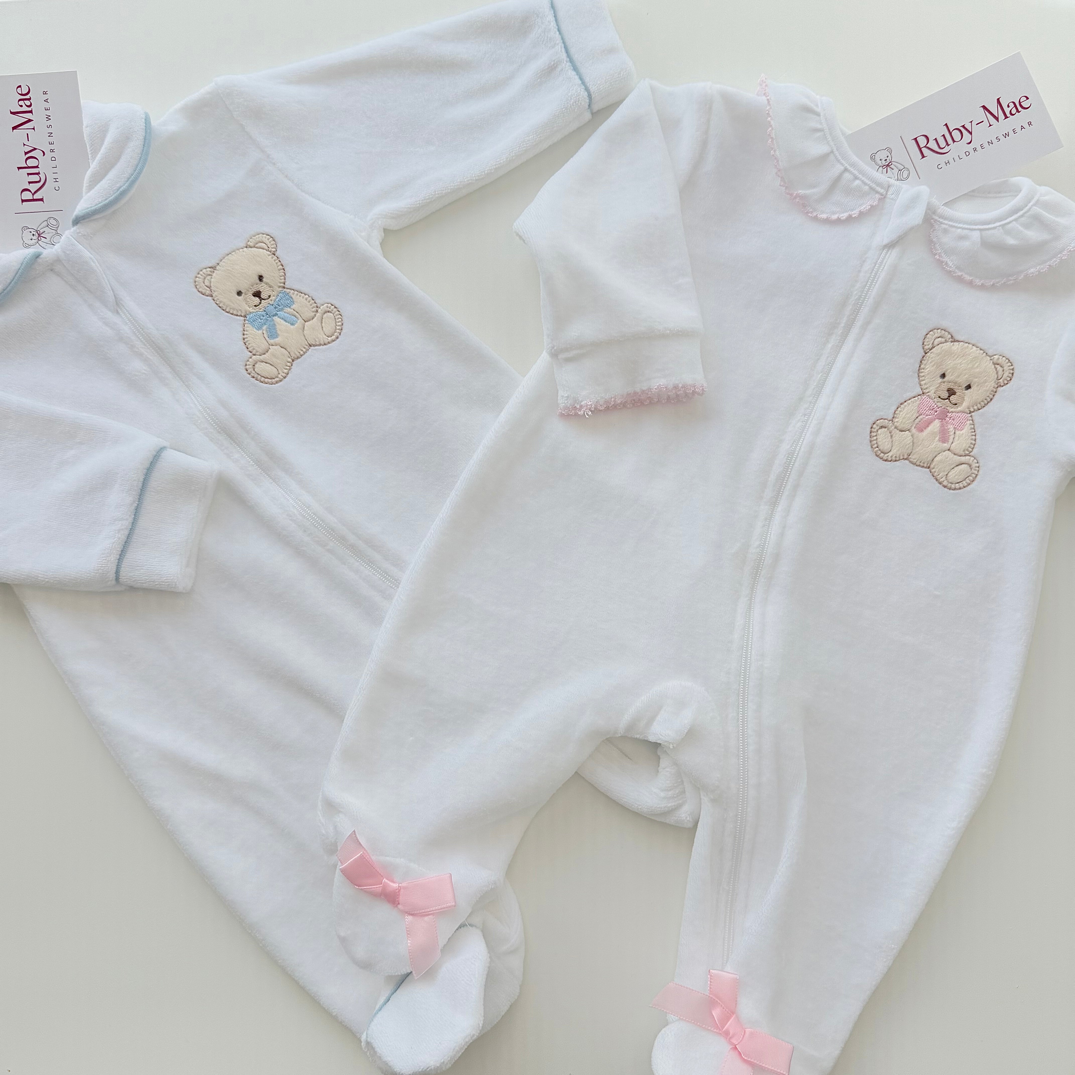 
                  
                    White Velour Baby Teddy Bear Sleepsuit – Pink & Blue
                  
                