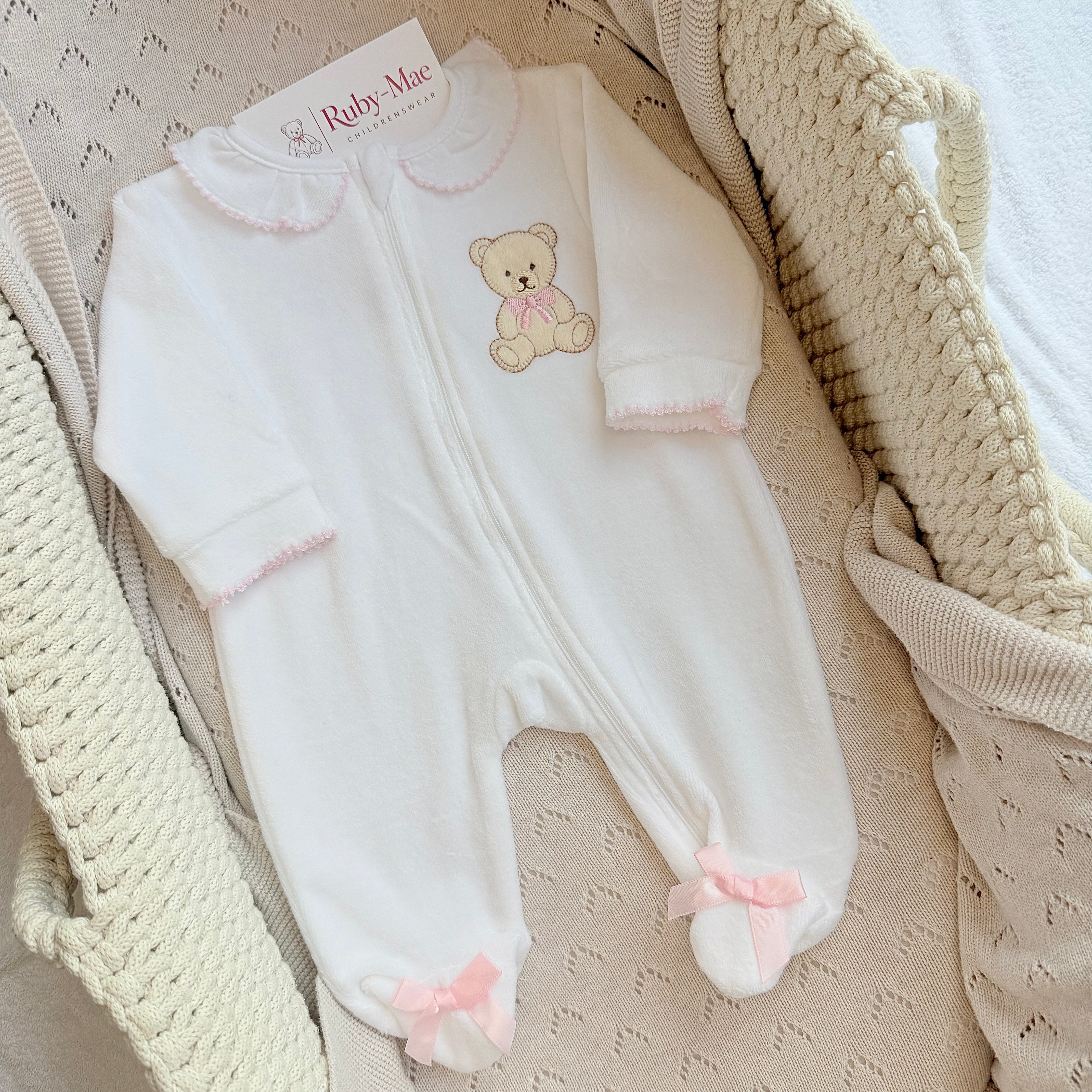 
                  
                    White Velour Baby Teddy Bear Sleepsuit – Pink & Blue
                  
                
