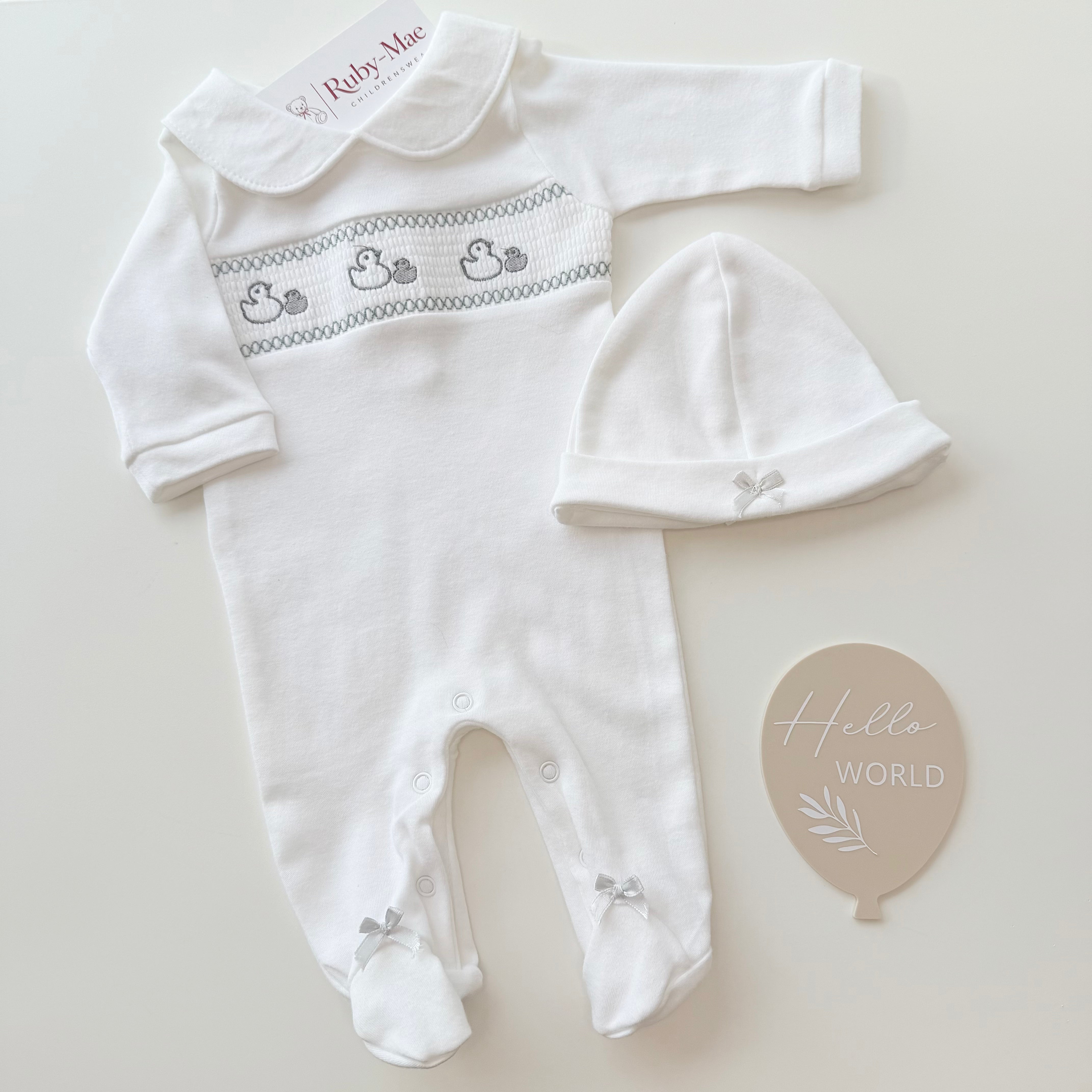 
                  
                    White Cotton Smocked Duck Sleepsuit & Hat Set
                  
                