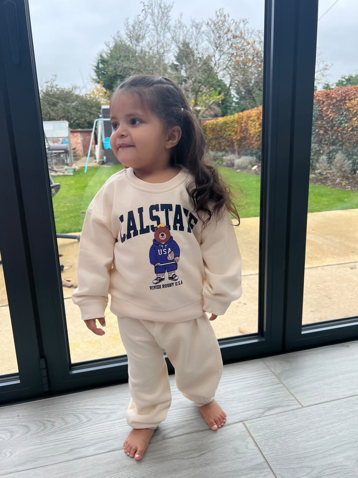 
                  
                    UNISEX Cream With Blue Calstate Teddy Tracksuit
                  
                