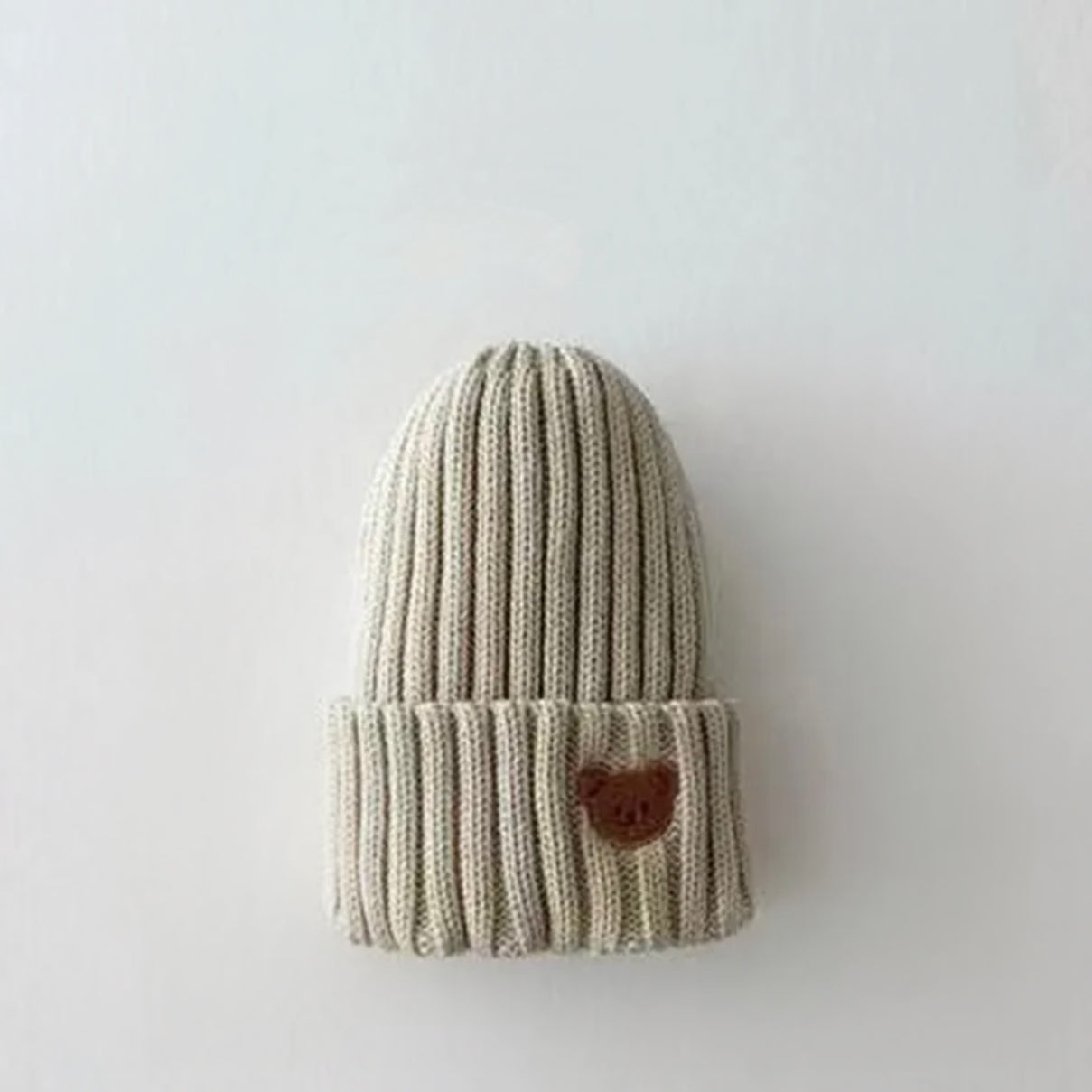 
                  
                    Knitted Teddy Hat
                  
                